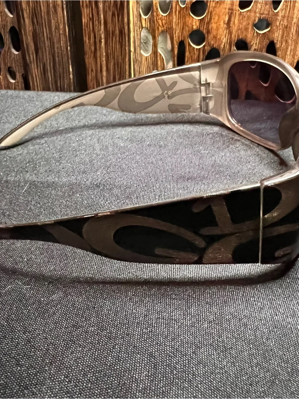 Dolce & Gabbana Black Frame Sunglasses with Dark Purple Lenses